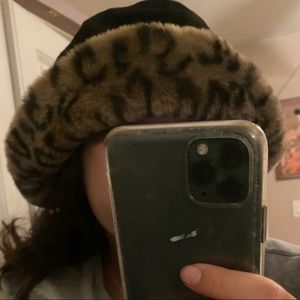 Black bucket hat with leopard fur inside